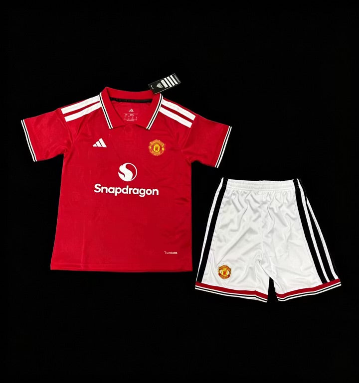 MANCHESTER UNITED NIÑOS 26-27 PRIMERA EQUIPACIÓN